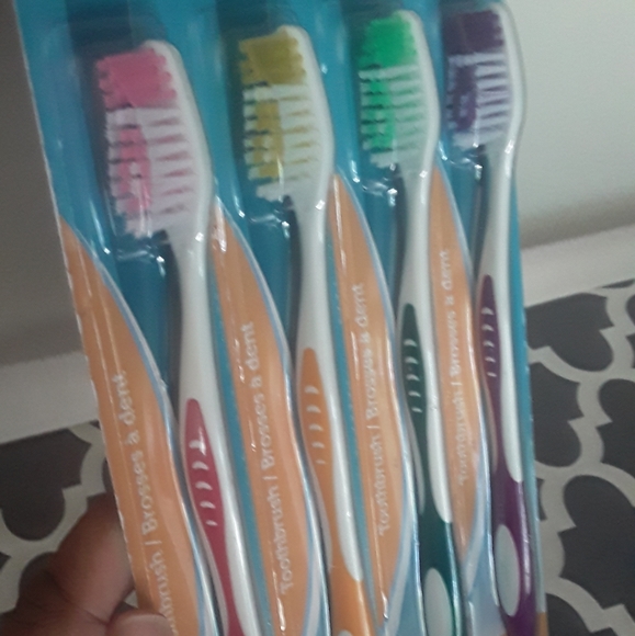 NWOT 4 pack toothbrushes - Picture 2 of 3